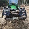 3000 Lb. John Deere Quick Attach Frame with 2 Iron Fist Sectional Grapples and 1 Rake