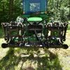 3000 Lb. John Deere Quick Attach Frame with 2 Iron Fist Sectional Grapples and 1 Rake