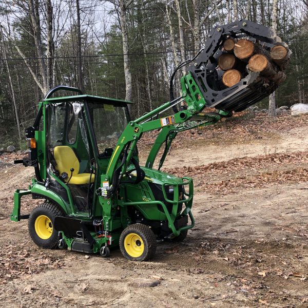 3000 Lb. John Deere Quick Attach Frame with 2 Iron Fist Sectional Grapples and 1 Rake