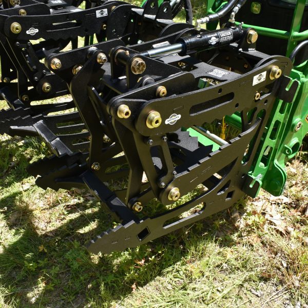 3000 Lb. John Deere Quick Attach Frame with 2 Iron Fist Sectional Grapples and 1 Rake